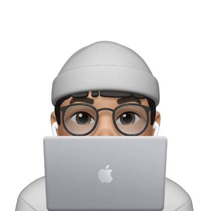 Person peeking from behind laptop